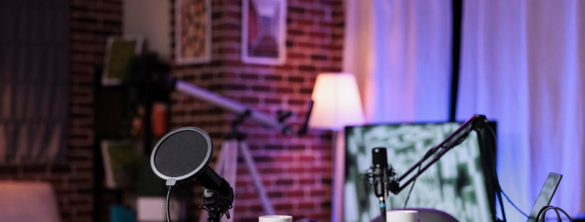An empty desk with podcast equipment