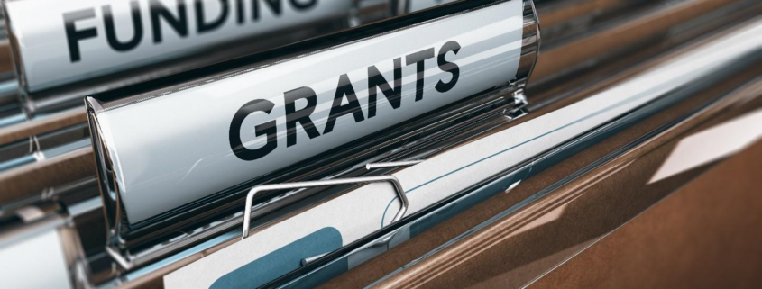 File cabinet with sections for grants, funding, and projects