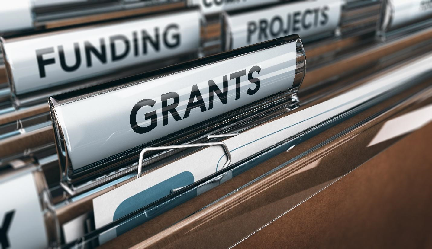 File cabinet with sections for grants, funding, and projects